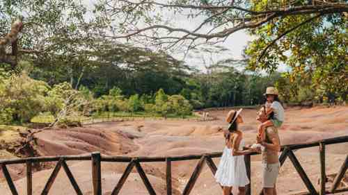 Visitors exploring the Chamarel Seven Coloured Earth Geopark in southwest Mauritius