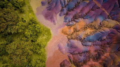Chamarel Seven Coloured Earth in Mauritius, showcasing vibrant natural sand dunes formed by volcanic activity